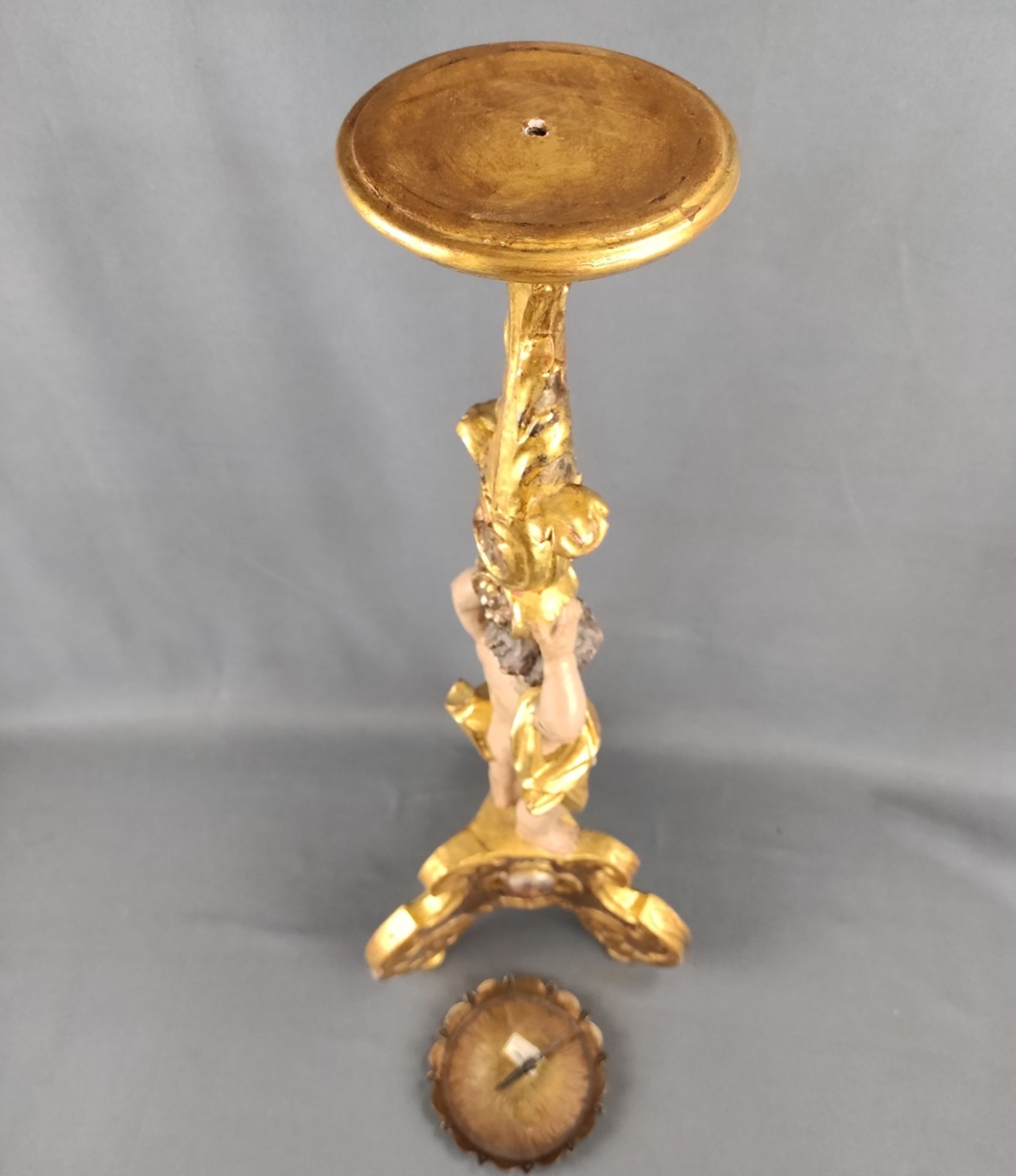 Large wooden candlestick in baroque style, carved, three-legged base with putto carrying profiled a - Image 3 of 5