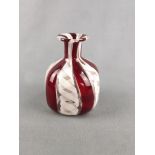 Small glass vase, design, alternating dark red fields with white thread enamels, mouth blown, heigh