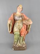 Heilige Lucia, Wandfigur auf achteckiger Basis, in ihrer linken Hand Teller mit ihren Augen, Holz g