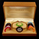 Gucci Vintage-Armbanduhr, Modell 11/12, in Originaletui, anbei insgesamt 12 Wechsellünetten, alle g