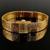 Armbanduhr, Universal Geneve, 750/18K Gelbgold, Gesamtgewicht 34,14g, Länge Band 16cm mit Clip-Vers