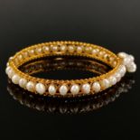 Fancy pearl gold bangle, 750/18K yellow gold (hallmarked), total weight 19.4g, bangle elaborately f