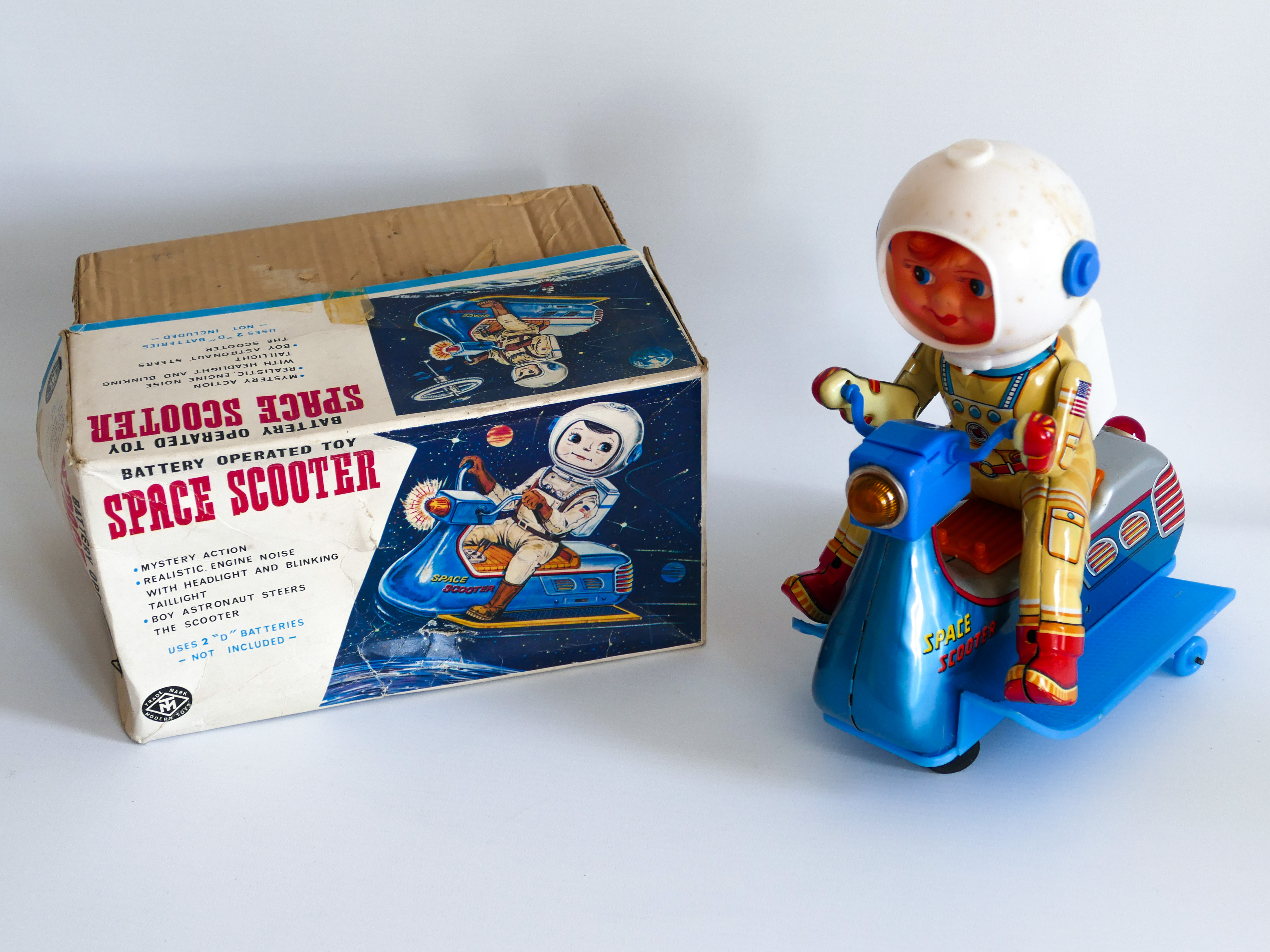 BATTERY OPERATED SPACE SCOOTER, TIN SPACE TOY ASTRONAUT. MASUDAYA MODERN TOYS JAPAN 1960's.