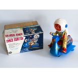 BATTERY OPERATED SPACE SCOOTER, TIN SPACE TOY ASTRONAUT. MASUDAYA MODERN TOYS JAPAN 1960's.