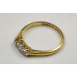 18ct gold ring with 3 small diamonds total weight 2.30grams