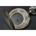 A mystery Swiss solid silver pocket watch with transparent glass dial with applied gilt Arabic