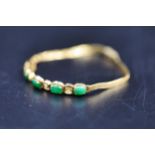 A lovely 14ct gold with jade and diamond bracelet - 4.5 grams