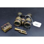 A Pair of Opera glasses, a trench art bullet lighter & a commemorative match box holder from Ypres