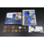 A selection of coins & commemorative coins & medals. Including a modern silver proof coin & a