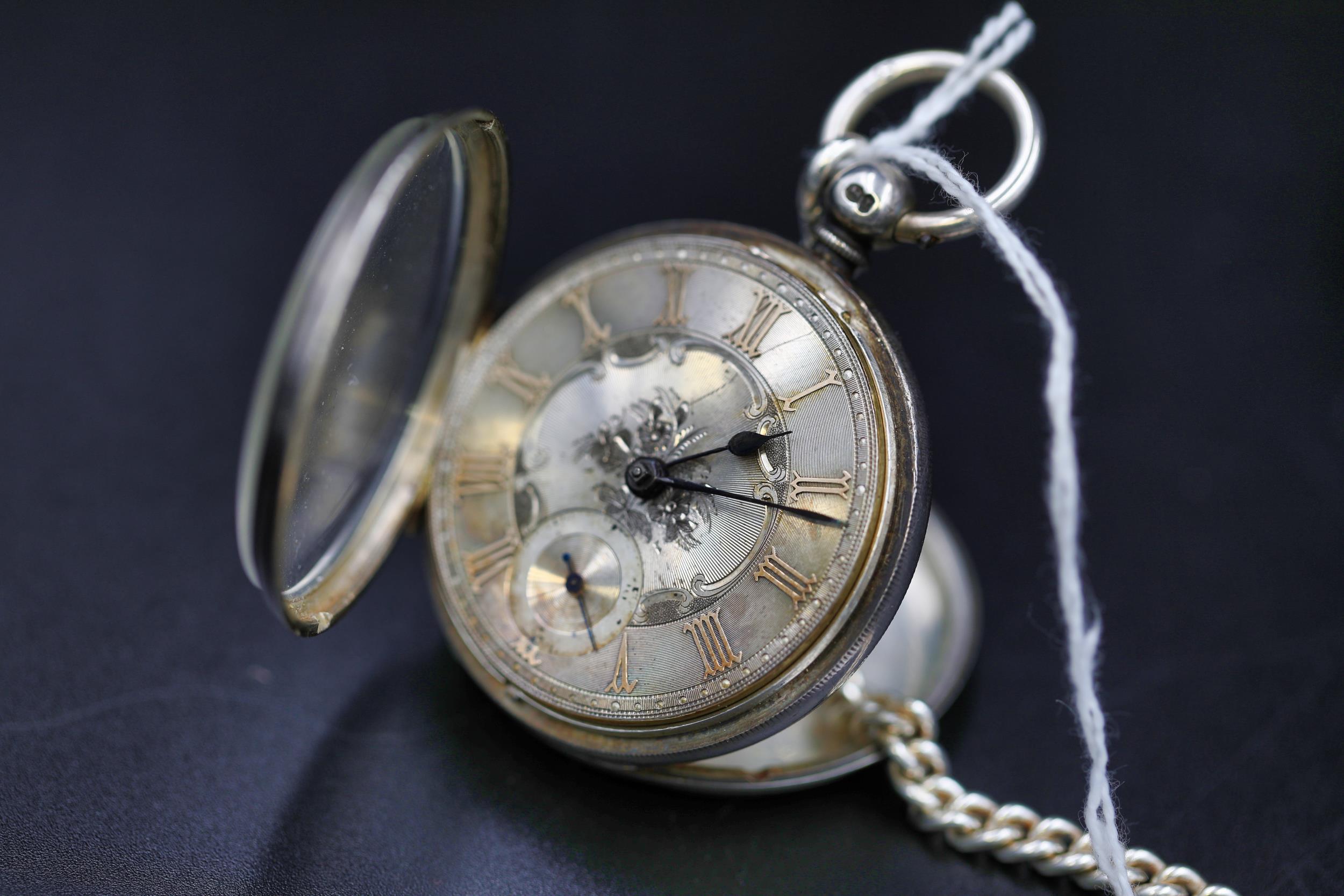 A Silver Pocket watch (London 1864) in original case with key (seems unwound) plus silver watch