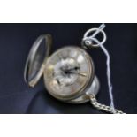 A Silver Pocket watch (London 1864) in original case with key (seems unwound) plus silver watch