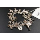Silver charm bracelet with 20 charms - 66 grams