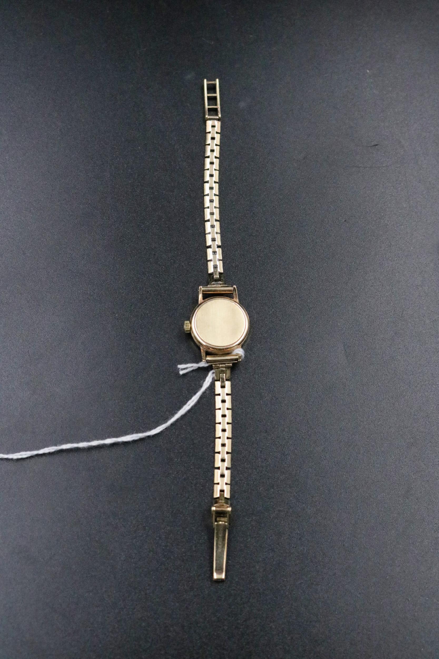 9ct gold ladies Omega watch including the bracelet in working condition (overall weight 16grams)