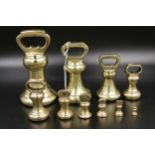 Set of Vintage brass weights, 11 weights from 1/4 oz to 7lbs. The 4lb weight engraved Herbert & sons