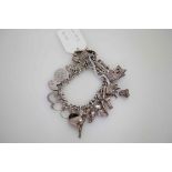 Silver Charm Bracelet 86 grams in weight