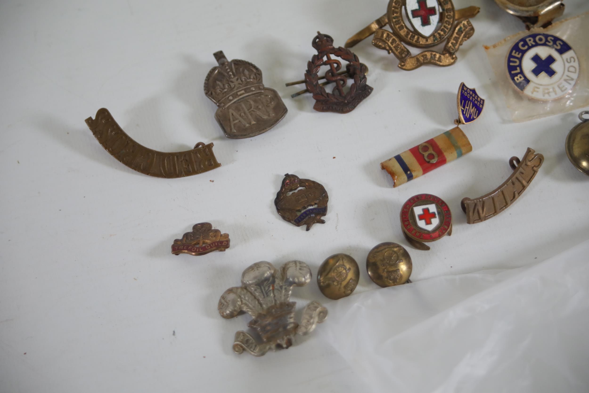 selection of vintage badges