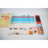 Good selection of boxed N gauge track and de coupler units plus metal rail