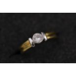 Diamond solitaire in rub over setting 18ct yellow gold Ring
