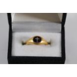 An 18CT Gold Priests Ring