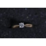 A Diamond solitaire ring set in 9ct yellow gold