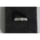 Princess cut diamond half eternity ring set in 18ct white gold