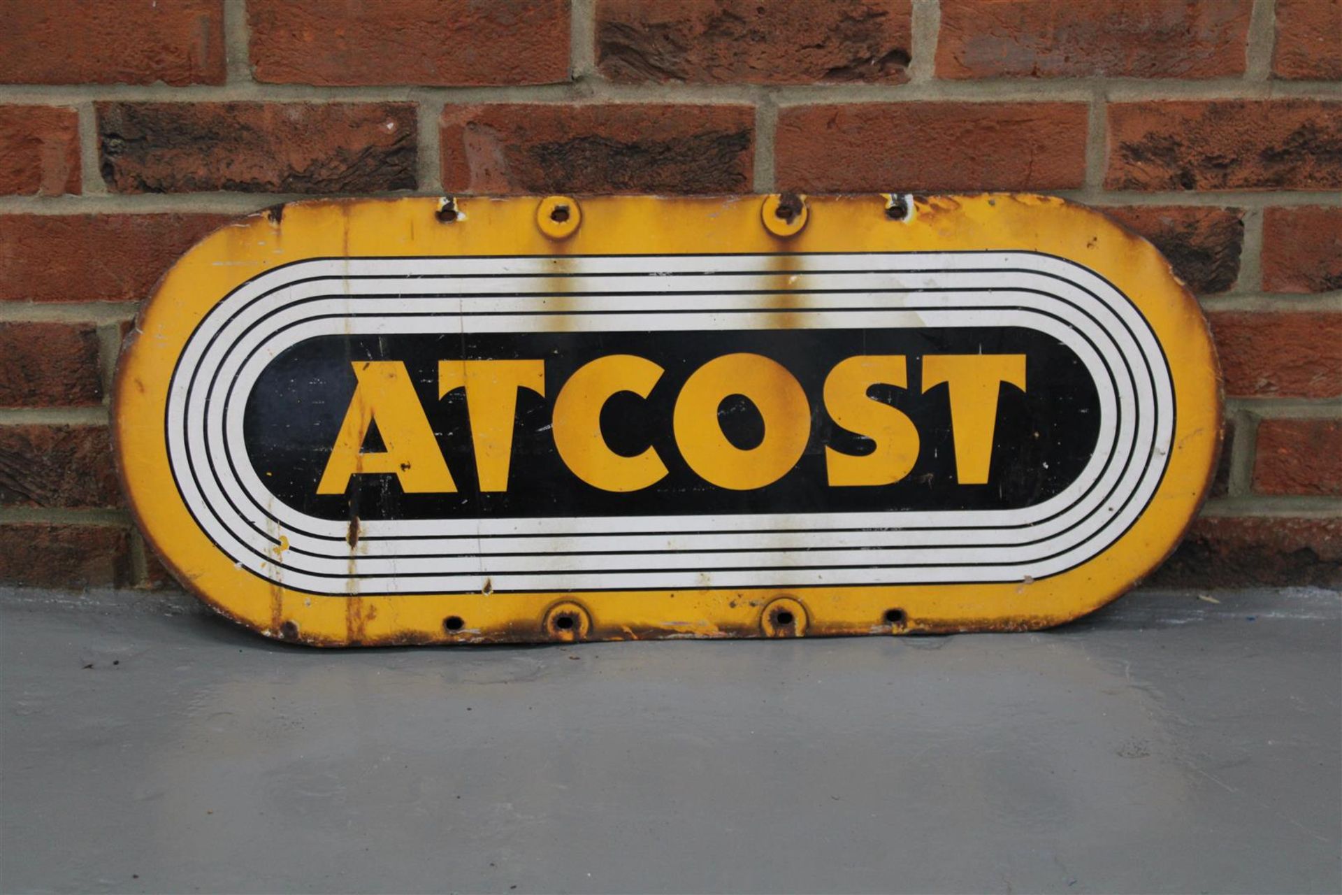 Enamel Atcost Sign