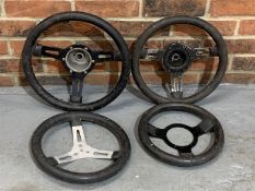 Four Vintage Steering Wheels