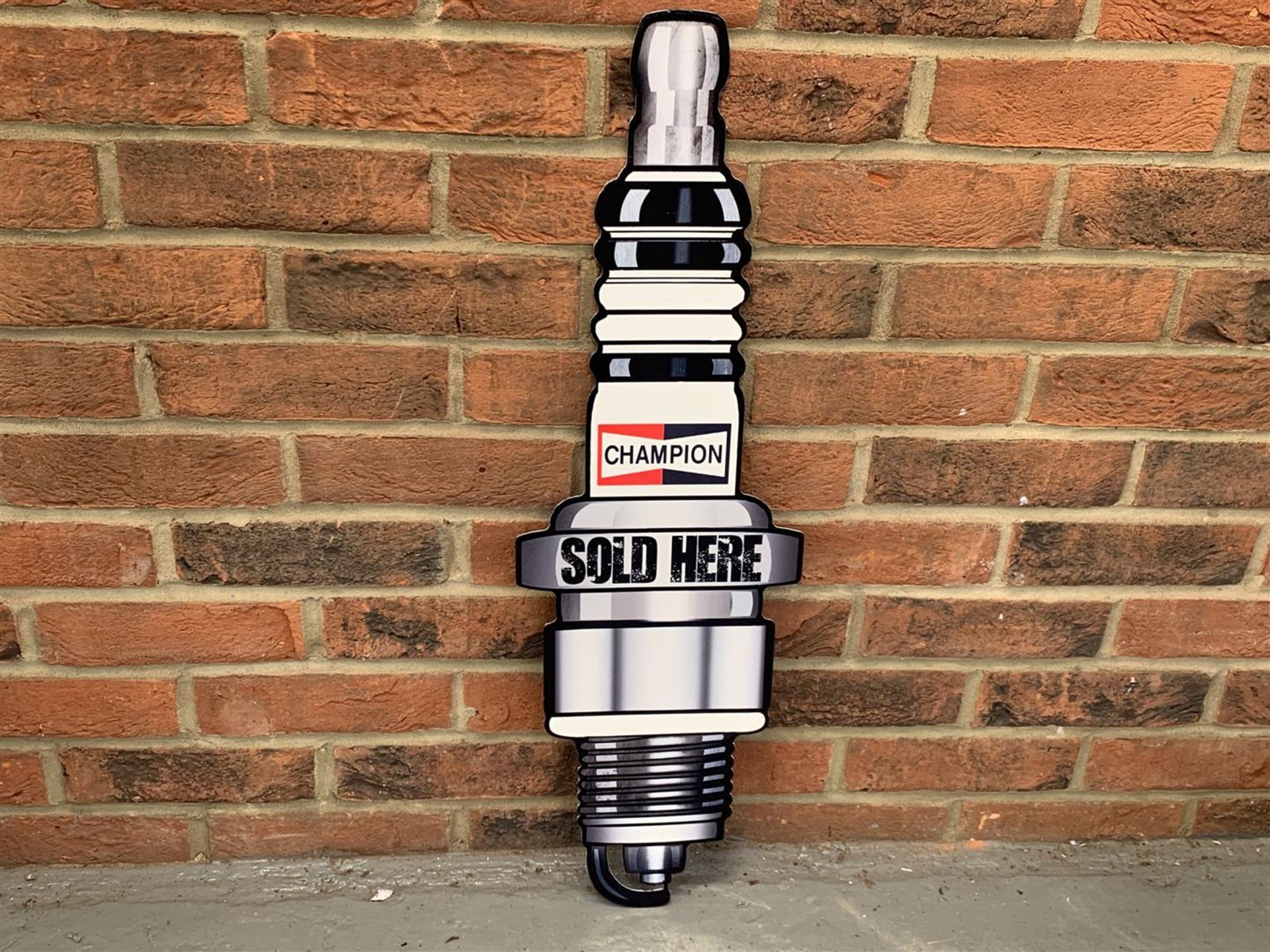 Metal Champion Spark Plugs Sold Here " Sign"