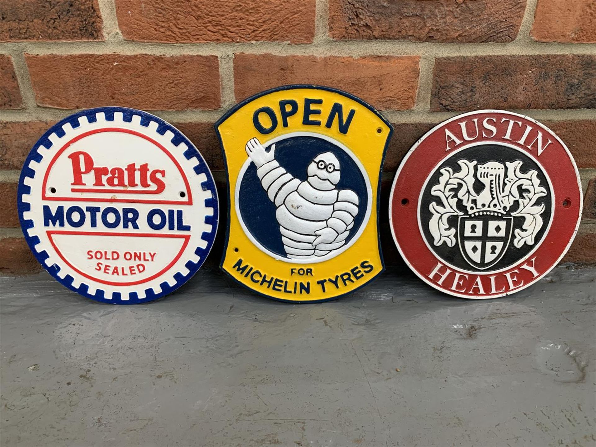 Three Cast Iron Signs, Michelin, Austin Healey & Pratts Motor Oil (3)