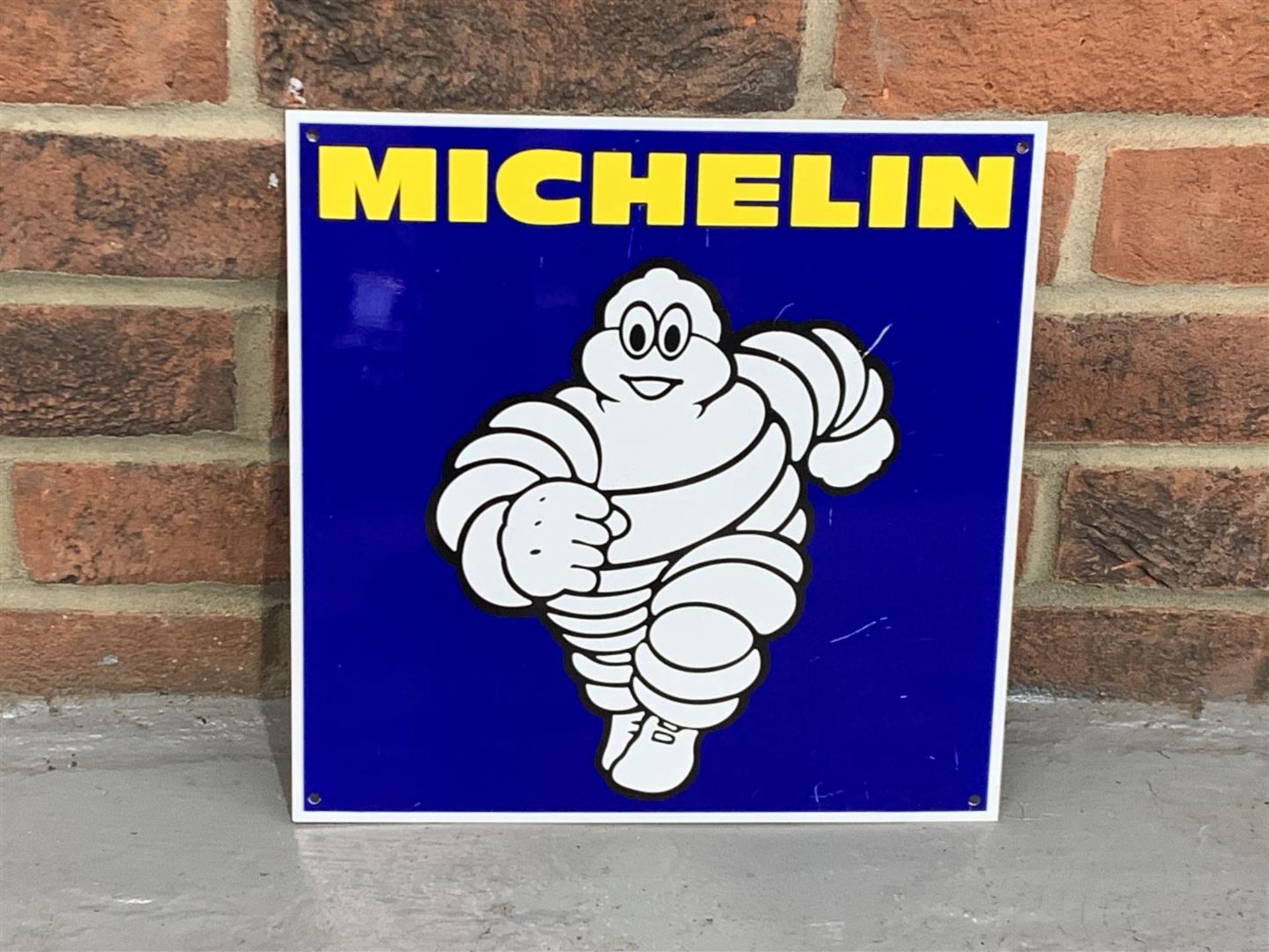 Small Metal Michelin Running Man Sign