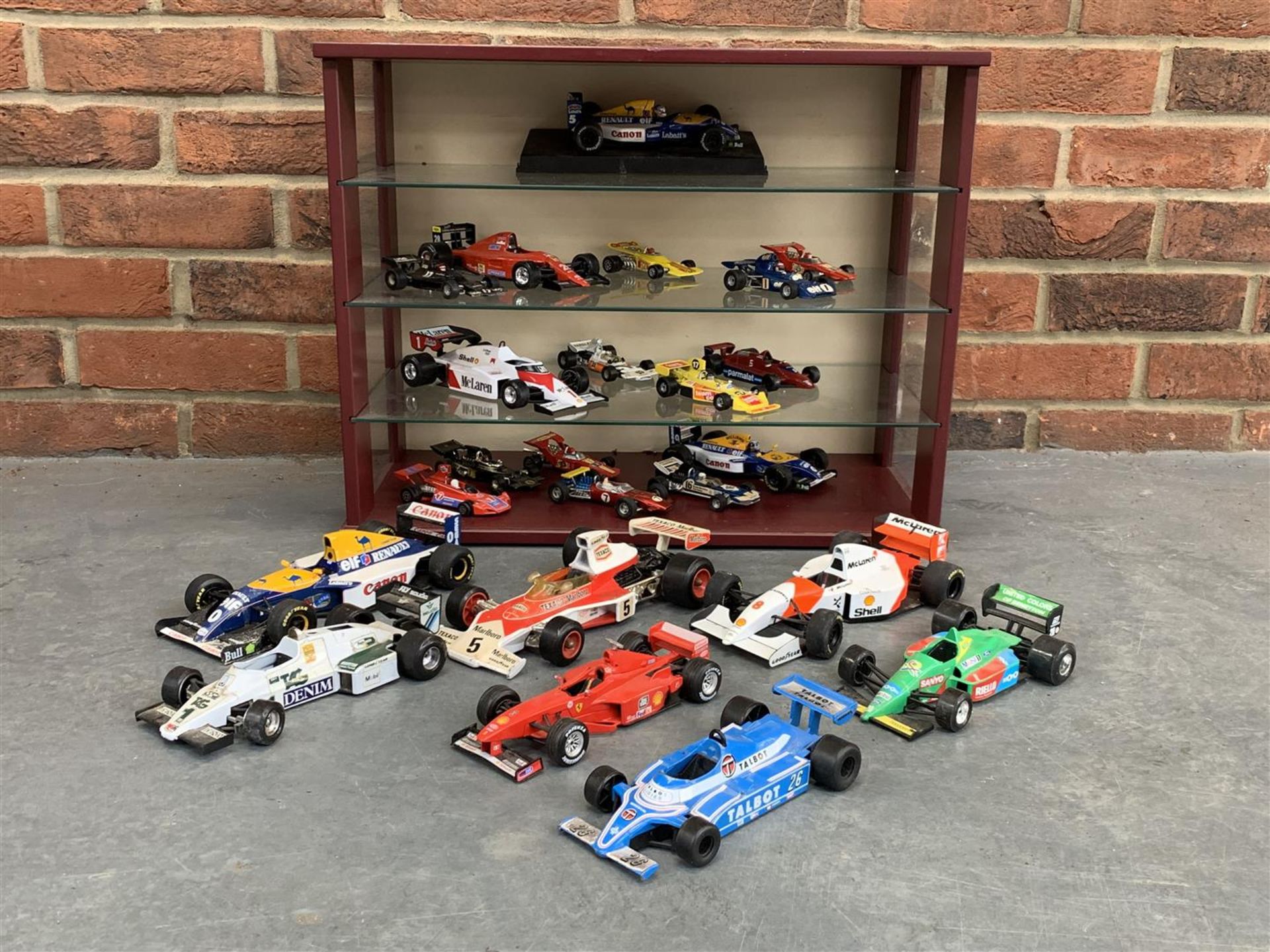 Case Containing A Quantity Of Formula 1 Model Cars