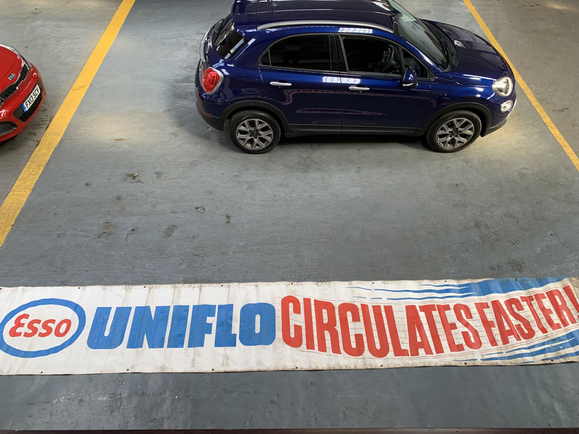 Large Esso Uniflo Circulates Faster" Banner"