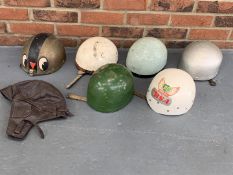 Seven Vintage Race Helmets (For Display Only)