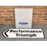 Two Plastic Triumph Signs