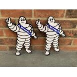 Two Small Metal Michelin Men