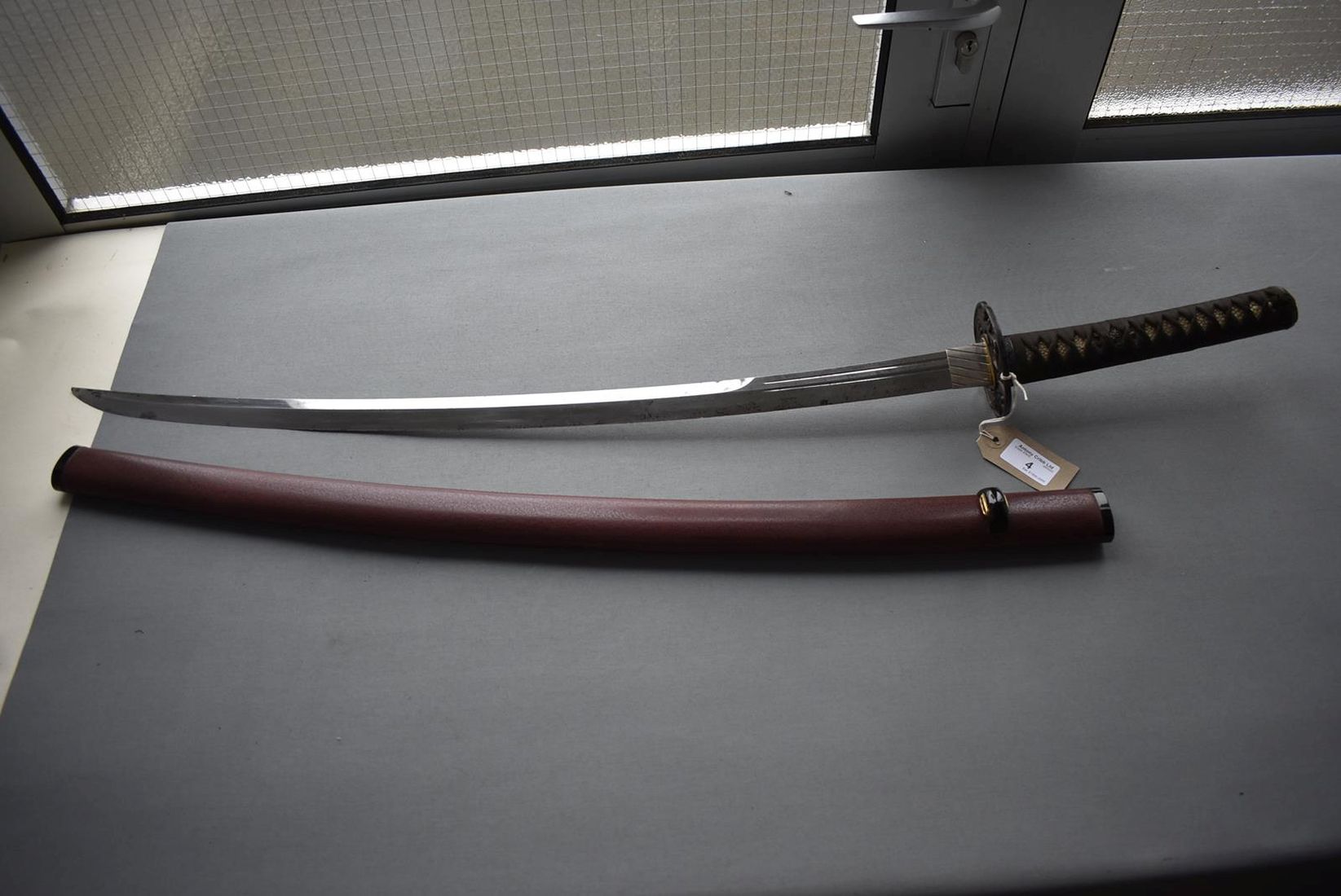 A KATANA, 67.9cm o-suriage Koto blade of Kamuri-otoshi form with twin hi, midare hamon, fully - Image 7 of 18