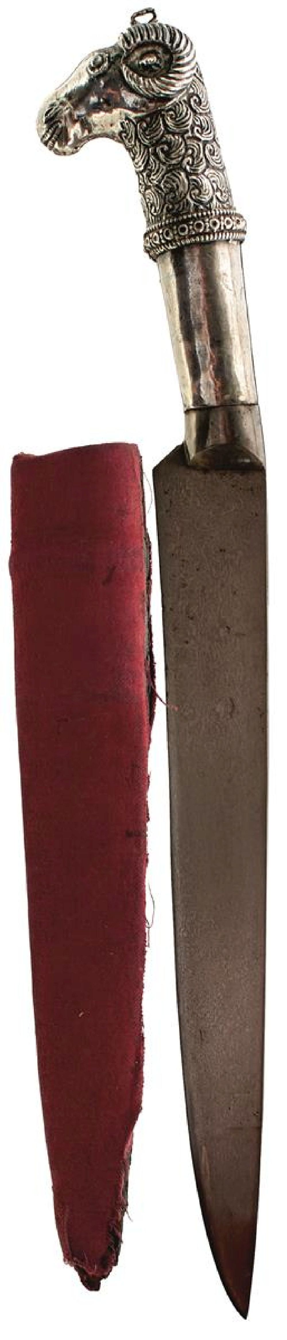 A 19TH CENTURY INDIAN RAM'S HEAD KARD OR DAGGER, 20.5cm wootz damascus blade, the white metal hilt