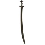 A LATE 18TH CENTURY INDIAN TULWAR, 70.5cm double fullered blade, characteristic hilt deeply