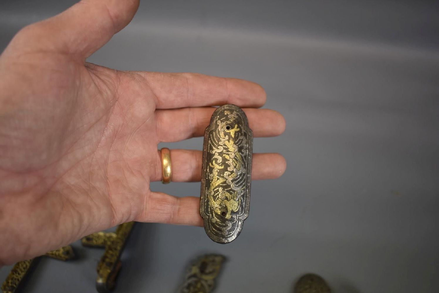 SIX VARIOUS TIBETAN HARNESS MOUNTS, four decorated with dragons amidst foliage in gilt and white - Image 7 of 16