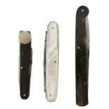 THREE VARIOUS POCKET KNIVES, comprising one with 8.5cm blade and saw blade of a similar length,