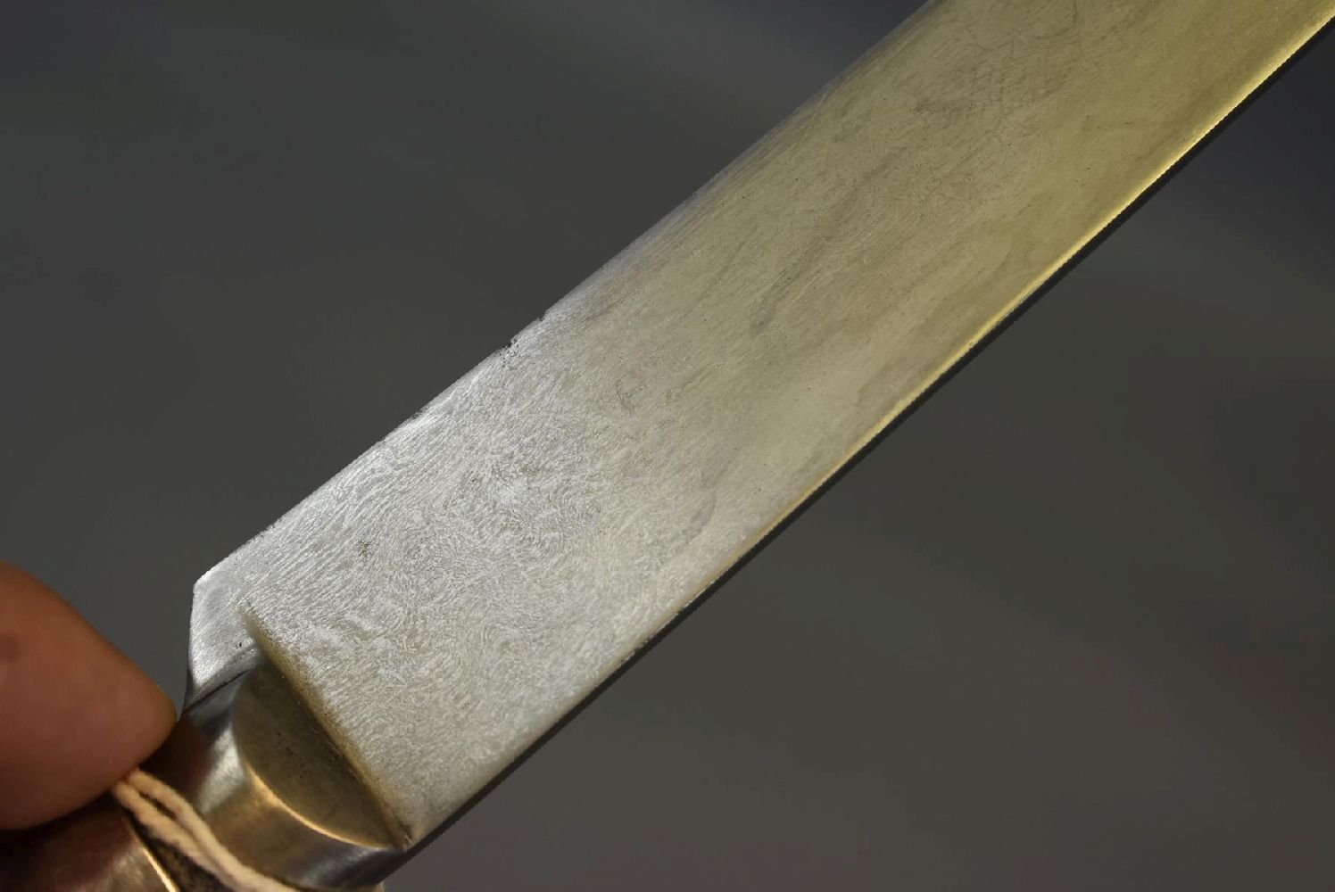 A 19TH CENTURY INDIAN RAM'S HEAD KARD OR DAGGER, 20.5cm wootz damascus blade, the white metal hilt - Image 7 of 11