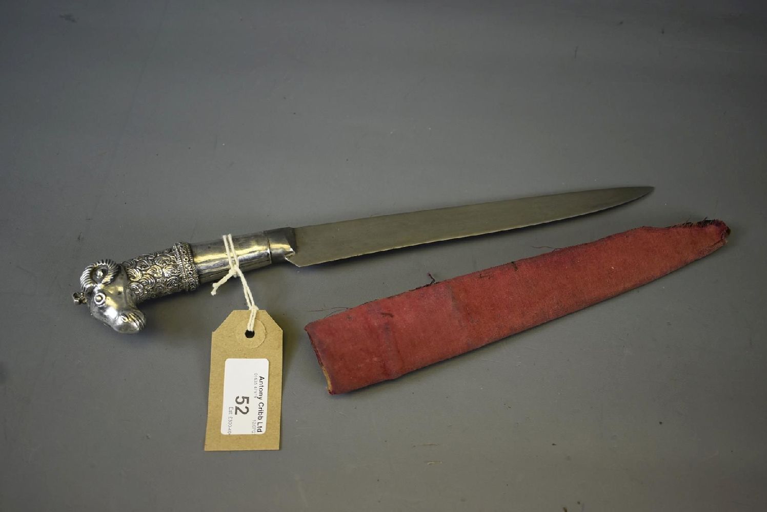 A 19TH CENTURY INDIAN RAM'S HEAD KARD OR DAGGER, 20.5cm wootz damascus blade, the white metal hilt - Image 2 of 11