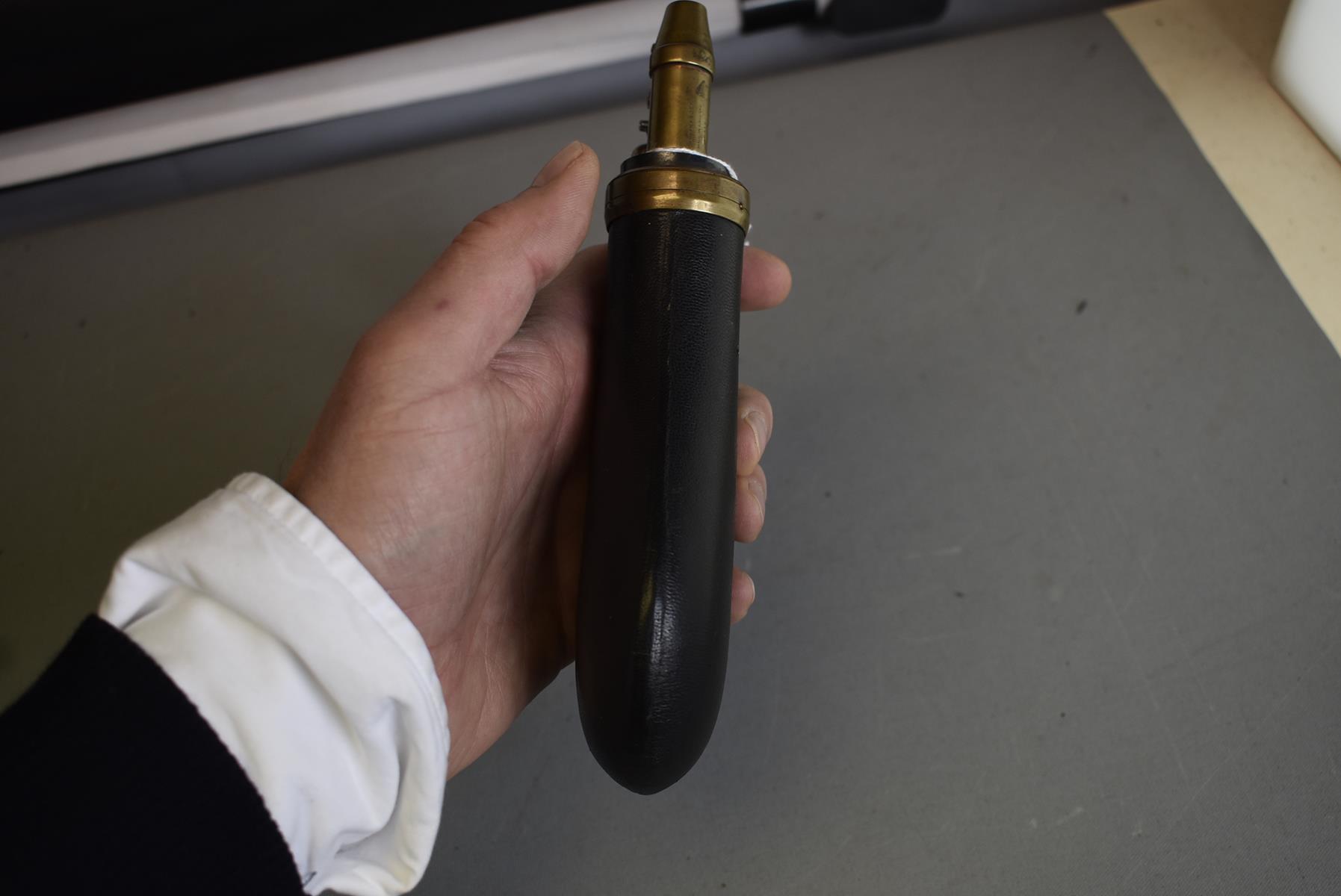 A 20TH CENTURY RIFLE FLASK BY DIXON & SONS, the leather covered body with adjustable sprung top. - Image 3 of 6