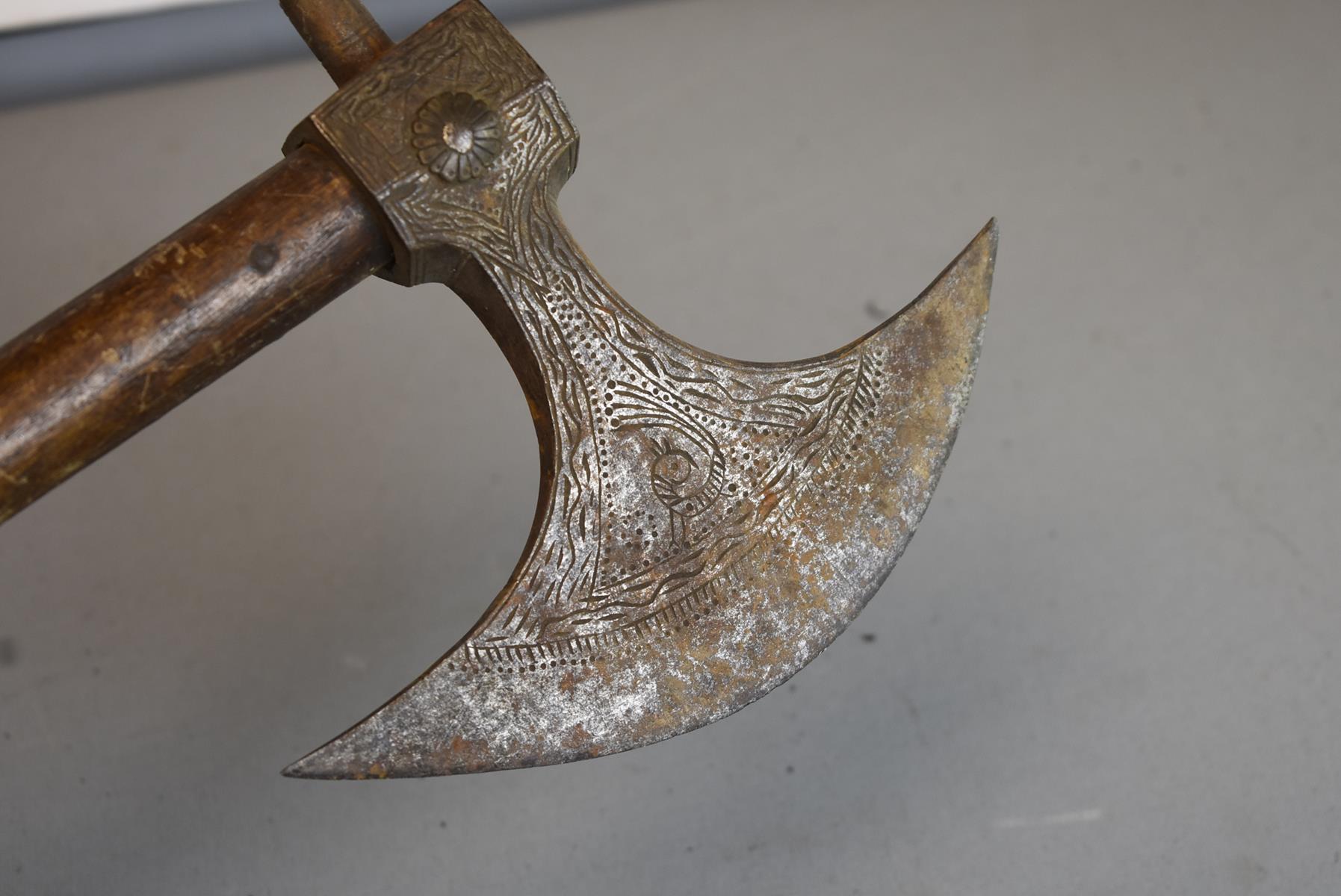 AN INDIAN AXE, the crescent shaped head with scrolling foliate decoration, together with another - Image 6 of 7