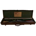 A CASED 18-BORE DOUBLE BARRELLED PERCUSSION SPORTING GUN, 30inch sighted damascus barrels, border