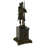 A CAST METAL STATUETTE OF A MEMBER OF THE 93RD REGIMENT OF FOOT, in full dress, complete with musket