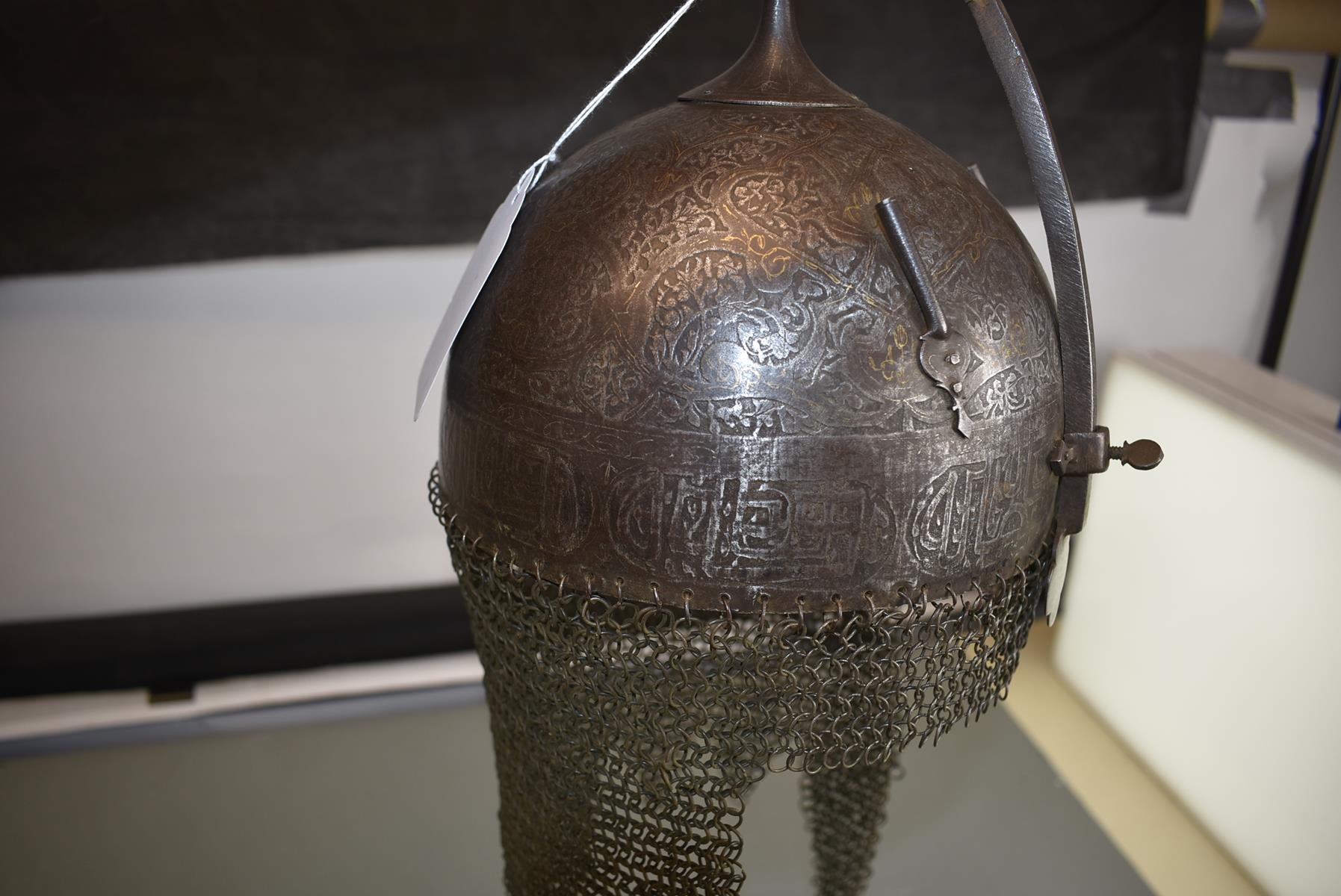 A 19TH CENTURY INDO-PERSIAN KULAH KHUD OR HELMET, the iron bowl etched overall with flowering - Image 5 of 13
