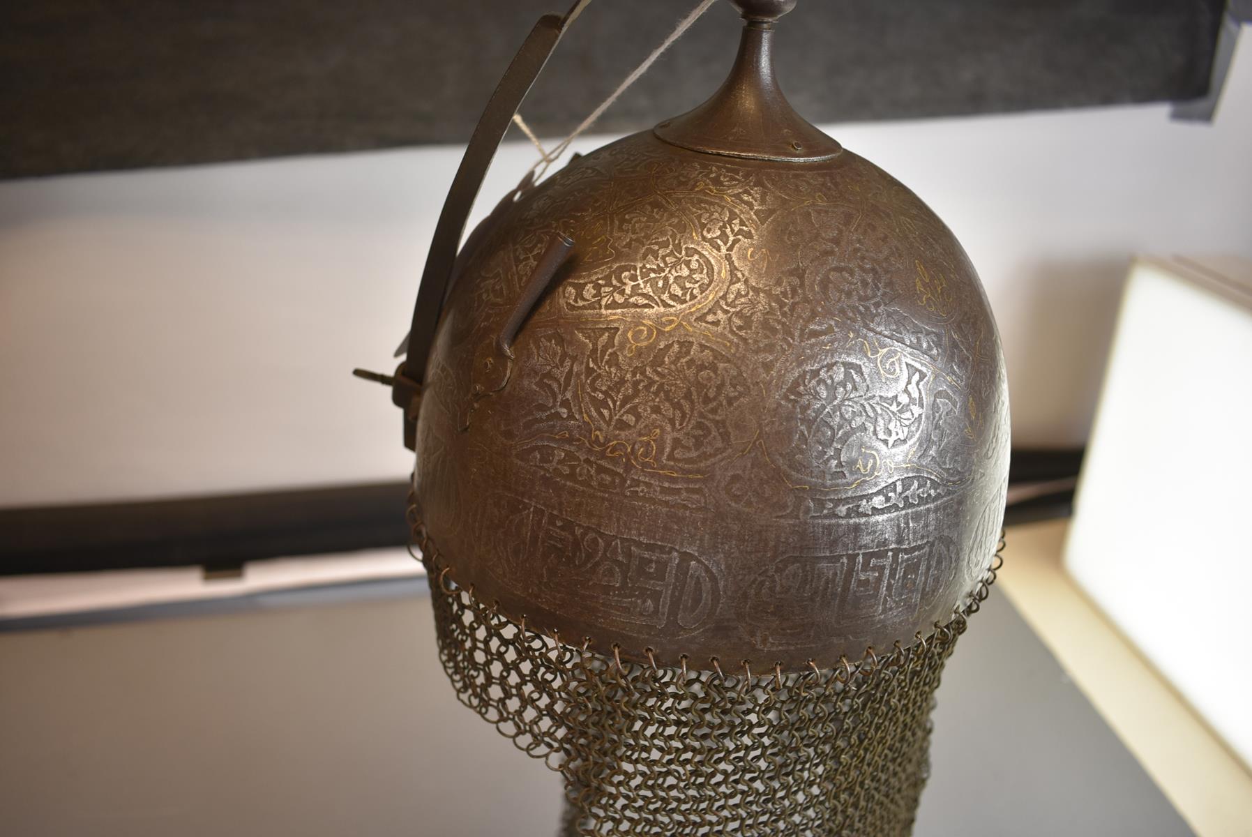 A 19TH CENTURY INDO-PERSIAN KULAH KHUD OR HELMET, the iron bowl etched overall with flowering - Image 7 of 13