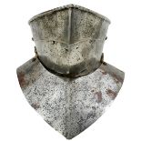 A 15TH CENTURY NORTH EUROPEAN ARTICULATED BEVOR, the rounded iron chin defence with raised medial