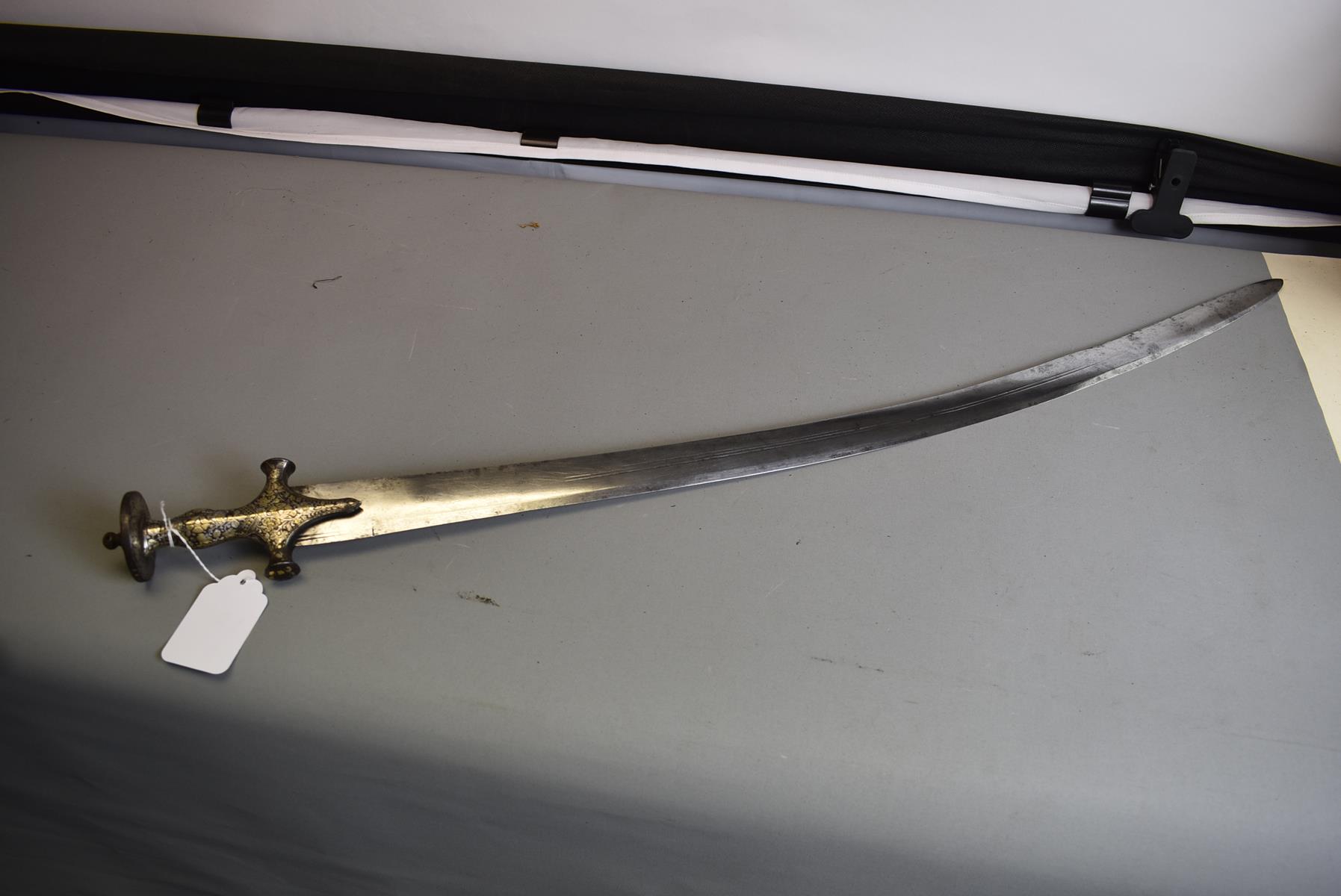 A LATE 17TH CENTURY INDIAN TULWAR, 87.75cm triple fullered curved blade, characteristic hilt - Image 4 of 13